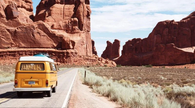 A yellow van that CarGuard Administration can cover takes a road trip through the desert