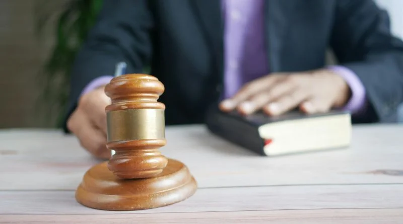 Lawyer holding the Brown Gave